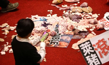 Pork intestines and other organs are seen on the ground after a protest in Taiwan’s legislative yuan.