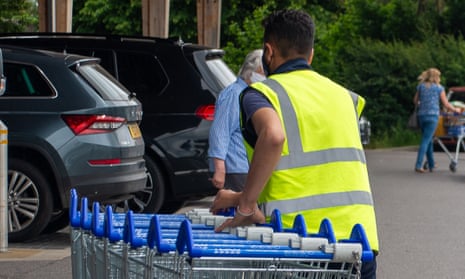 A supermarket worker in England. 