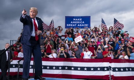 Donald Trump arrives at a rally in Michigan.