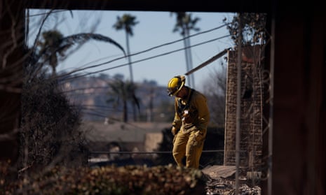 Firefighter in damaged home