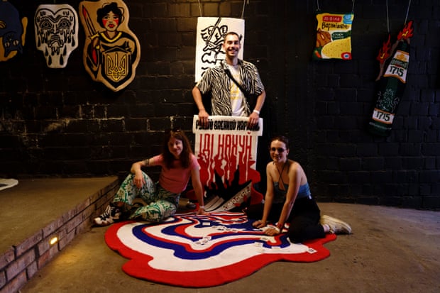 The Thugs Rugs crew show off some of their new designs featuring motifs from the war.