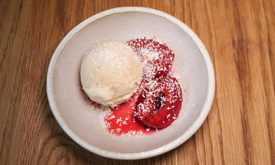 ‘Enthusiastically refreshing’: coconut and cardamon sorbet with roast plums.