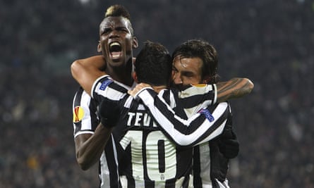 Paul Pogba (left), Carlos Tevez and Andrea Pirlo, here celebrating a goal against Trabzonspor in 2014, are among Fabio Paratici’s notable signings for Juventus.