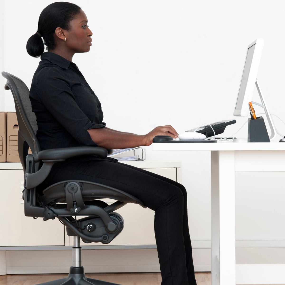 how to sit properly at work health wellbeing the guardian