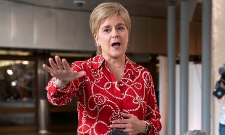 Nicola Sturgeon, the former first minister, speaks to the media on her return to Holyrood, following her arrest in the police investigation into the SNP's finances.