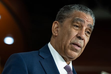 a man in a suit speaks