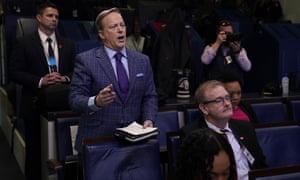 Sean Spicer, now reporter for Newsmax, left, attends a coronavirus taskforce briefing at the White House last week.