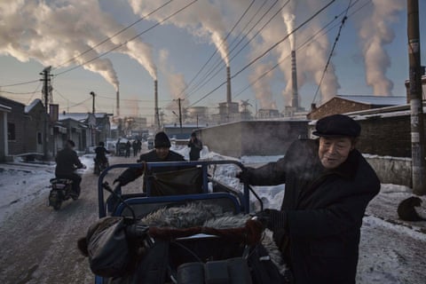 Winner in the Daily Life singles category, Kevin Frayer’s image titled China’s Coal Addiction, taken in Shanxi, China