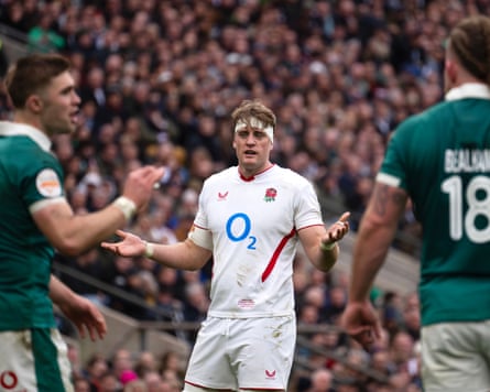 England’s Alex Coles is confronted by Ireland at Twickenham