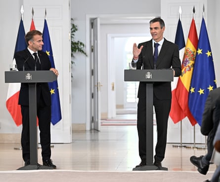 Pedro Sánchez, right, speaking alongside Macron in Madrid