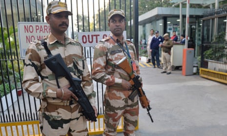 Police stand guard outside the BBC’s New Delhi office after authorities raided the building to investigate ‘tax evasion’. 