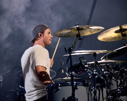 Chris Hemsworth playing the drums