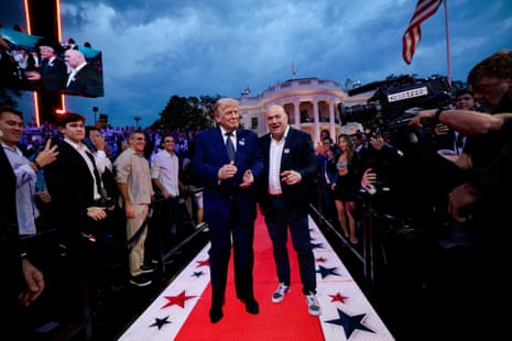 Trump and White take their seats before Sunday’s fights to a grand entrance.