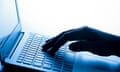 Woman's hand pressing keys of a laptop keyboard