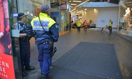 Police guard the Westfield shopping centre in Bondi Junction after part of the roof caved in during a storm on Wednesday.