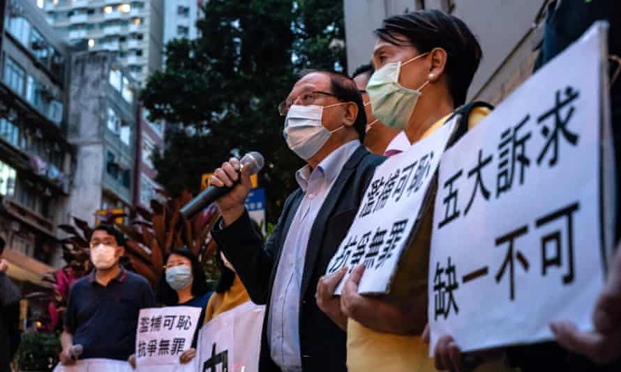 Pro-democracy supporters outside Hong Kong’s western district police station on Saturday