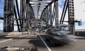 Cars travel over the Sydney Harbour Bridge