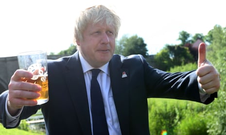 Former London Mayor, and “Vote Leave” campaigner, Boris Johnson is pictured with a pint of beer giving a thumbs up ahead of meeting with members of the public and supporters in Piercebridge, near Darlington, north-east England on June 22, 2016, as he continues to campaign for a Brexit ahead of the June 23 EU referendum. Wednesday is the last day of campaigning for Britain’s referendum on whether or not to stay in the EU, a momentous decision with far-reaching implications for Britain and Europe. / AFP PHOTO / SCOTT HEPPELLSCOTT HEPPELL/AFP/Getty Images