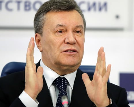 Viktor Yanukovych at a news conference in Moscow