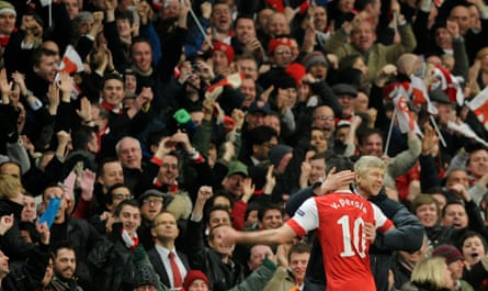 Arsenal’s Robin Van Persie (left) celebrates with manager Arsene Wenger after scoring goal against Barcelona during a Champions League, round of 16, first leg match in February 2011