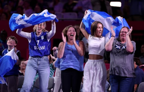 Scotland supporters celebrate their team’s victory over Malaysia in the 3x3 basketball.