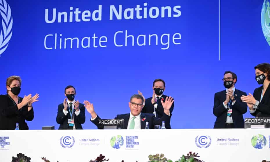 Cop26 president Alok Sharma receives applause after giving the closing speech as he attends the Closing Plenary of the COP26 Climate Summit.