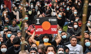 Demonstrators attend a Black Lives Matter protest in Sydney to express solidarity with US protestors and demand an end to frequent Aboriginal deaths in custody in Australia.