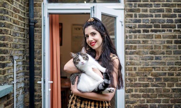 Sirin Kale and her cat, Larry. Where does he go all day?