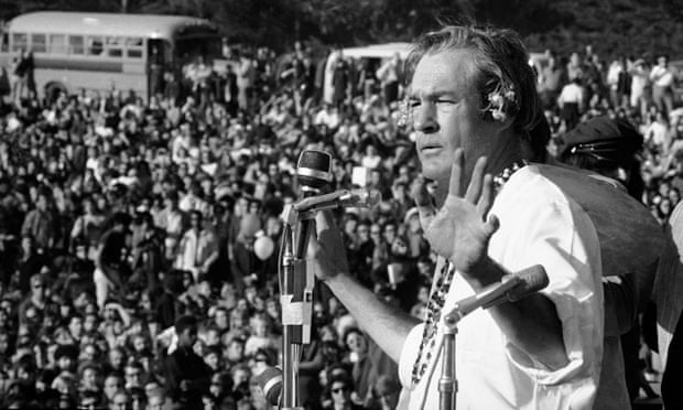 Timothy Leary addresses a crowd of hippies at the 'Human Be-In' that he helped organise in Golden Gate Park, San Francisco, California, in January 1967. Leary told the crowd to 'Turn on, tune in and drop out'