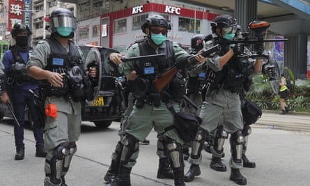 China has pledged to ‘guide and support’ Hong Kong police as they tackle protests over the new law.