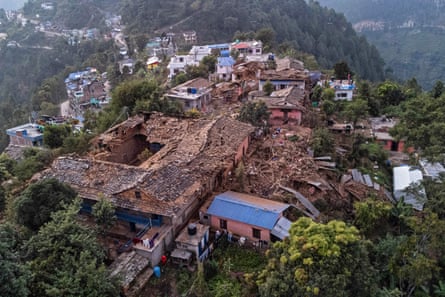 An aerial view shows collapsed houses in Chiuri