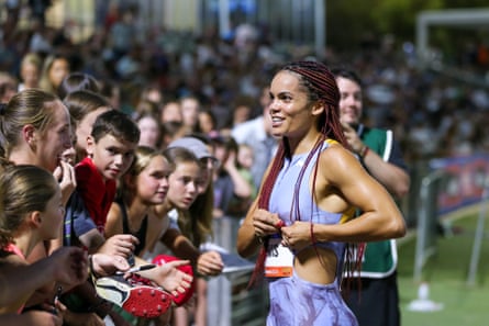 Lewis talks to young fans after winning the women’s 200m during the 2024 Adelaide Invitational