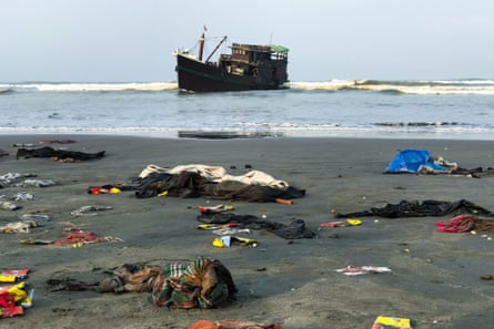 The belongings of Rohingya refugees on the shore as their boat remains anchored in Teknaf on 16 April.