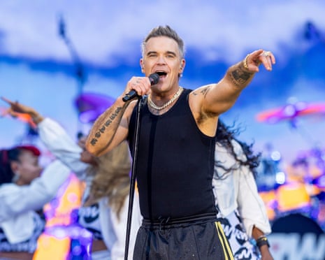 Robbie Williams review â dazzling superstar glow from the 'King of Entertainment' | Robbie Williams | The Guardian