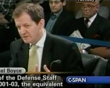 Andrew Edwards behind Alastair Campbell