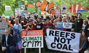 The Australian Youth Climate Coalition (AYCC) and the Australian Conservation Foundation (ACF) protest against the federal government and Indian company Adani at Treasury Place in Melbourne, Monday, Dec. 5, 2016.