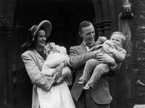 British stage and screen actress Judy Campbell and her husband David Birkin at the christening of their baby daughter, Jane Birkin, with their son Andrew