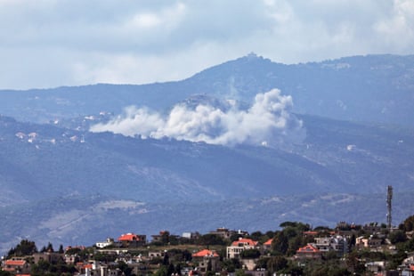 Smoke rises after an Israeli strike in south Lebanon, as seen from the Israeli side of the border in the Upper Galilee, northern Israel, 14 June 2026.