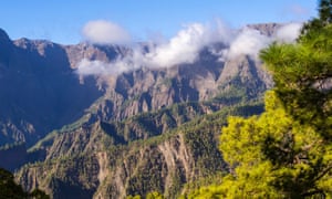 Clouds float in front of the Caldera de Taburiente mountains.