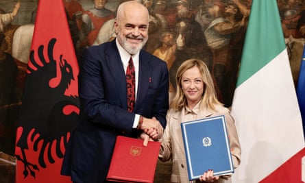 Albania’s prime minister Edi Rama and Italy’s Giorgia Meloni shake hands