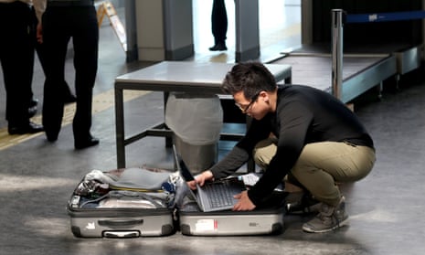 A passenger at Atatürk airport in Istanbul, Turkey, responds to the new laptop regulations this week.