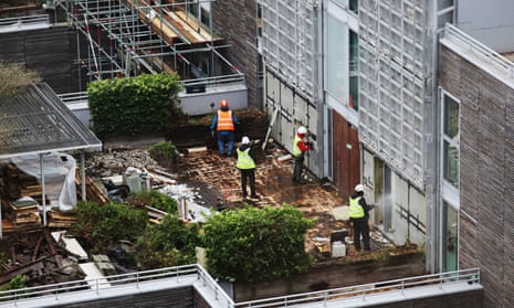 Contractors undertake works at a property in Paddington, London, to remove and replace non-compliant cladding. 