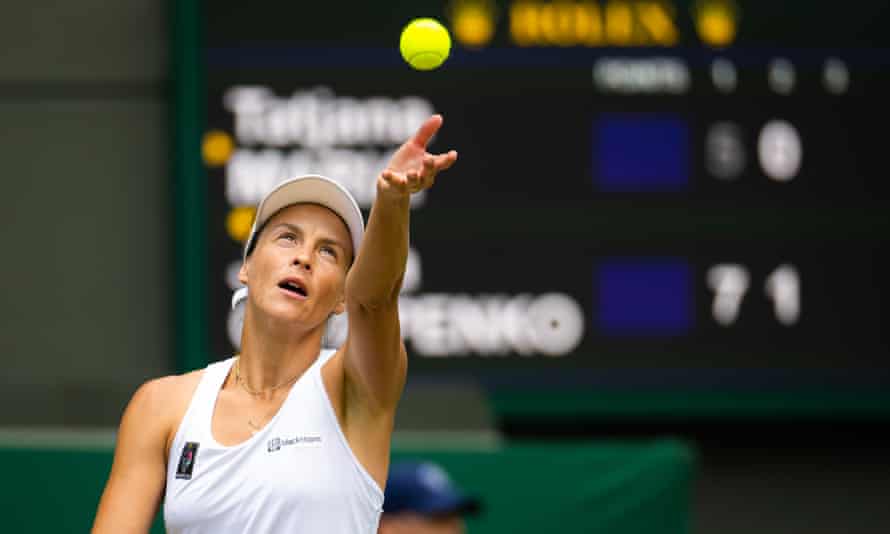 Tatjana Maria serves at Wimbledon