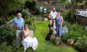 Barbara Seymour and family in her garden.