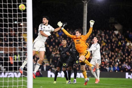 Raul Jimenez battles for possession with Robin Roefs.