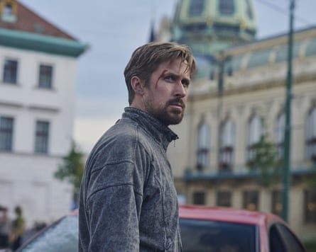 A man with a goatee beard looks oensive and determined