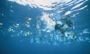 Plastic and rubbish floating in the ocean.
