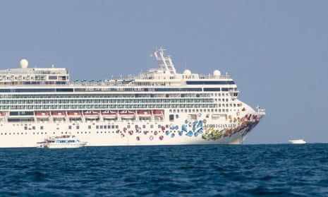 Cruise ship and small motor boat