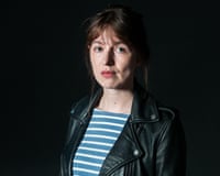 Sally Rooney in a black leather jacket posing for a portrait