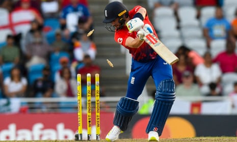 Chris Woakes of England bowled by Andre Russell of the West Indies.